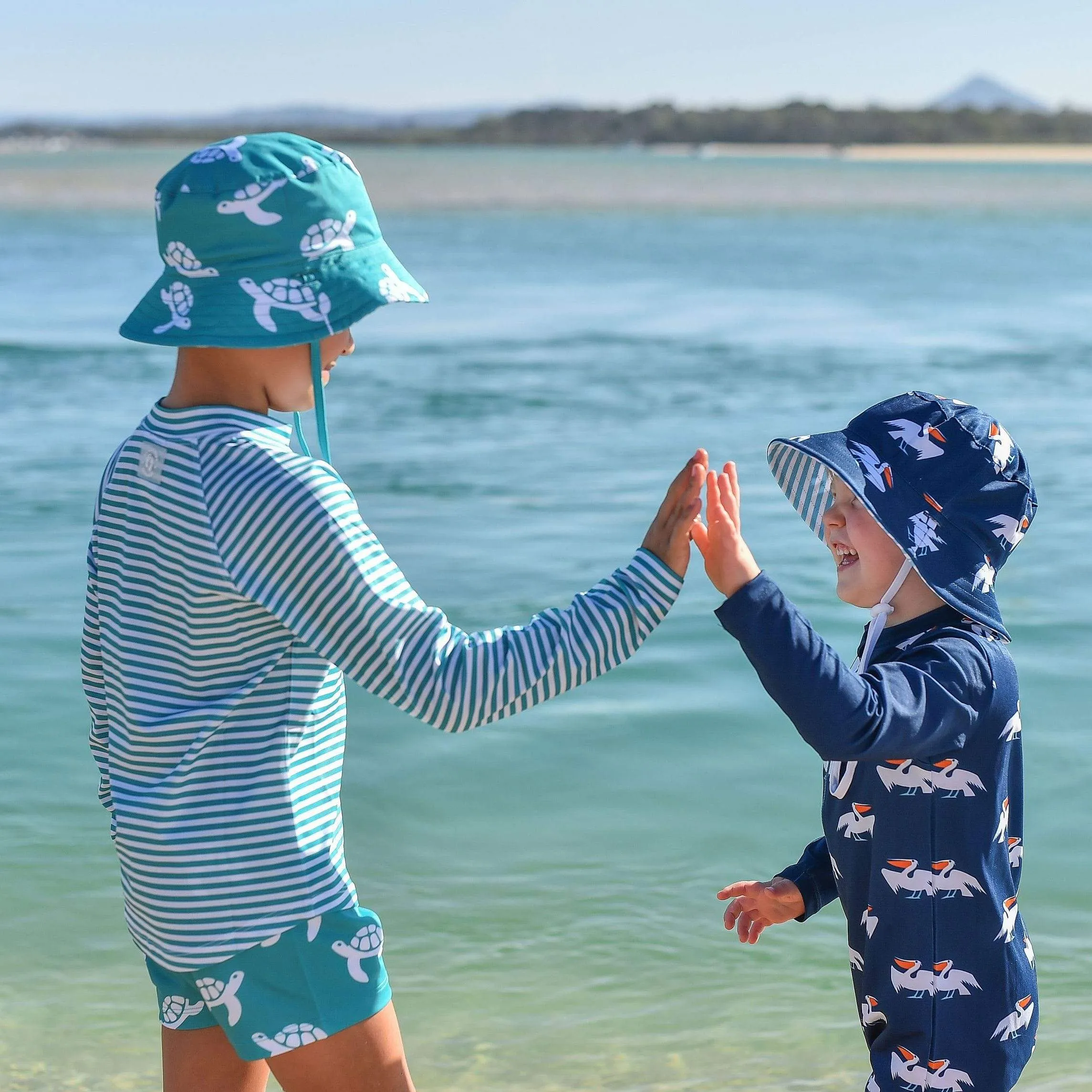 Navy Pelican Scoop Toddler Sunsuit